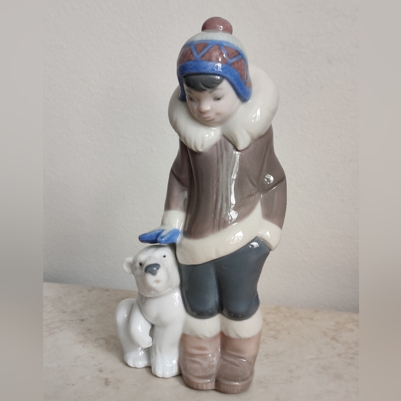 Lladro Other - Lladro "Eskimo Riders" Inuit Boy with a cub Porcelain Figurine